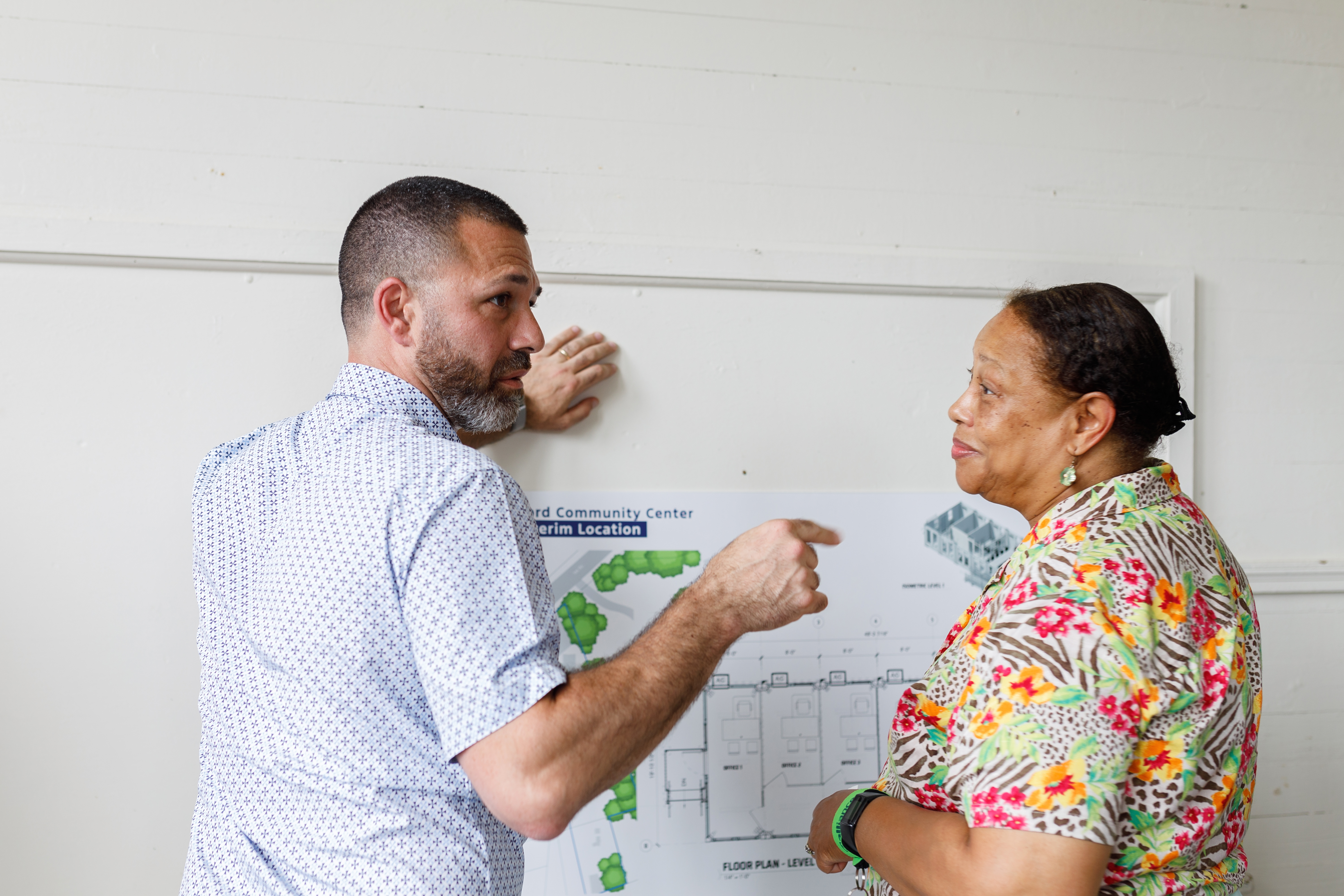 Dr. Clarice White, project champion and Stanton School alumna, along with Hassan Hammoud, Senior Manager of Essential Services for Ford Philanthropy, discuss plans for the future Ford Community Center.